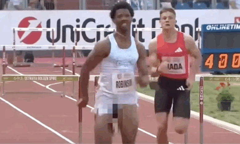 Awkward moment US sprinter suffers severe wardrobe malfunction mid-race but still manages to finish first